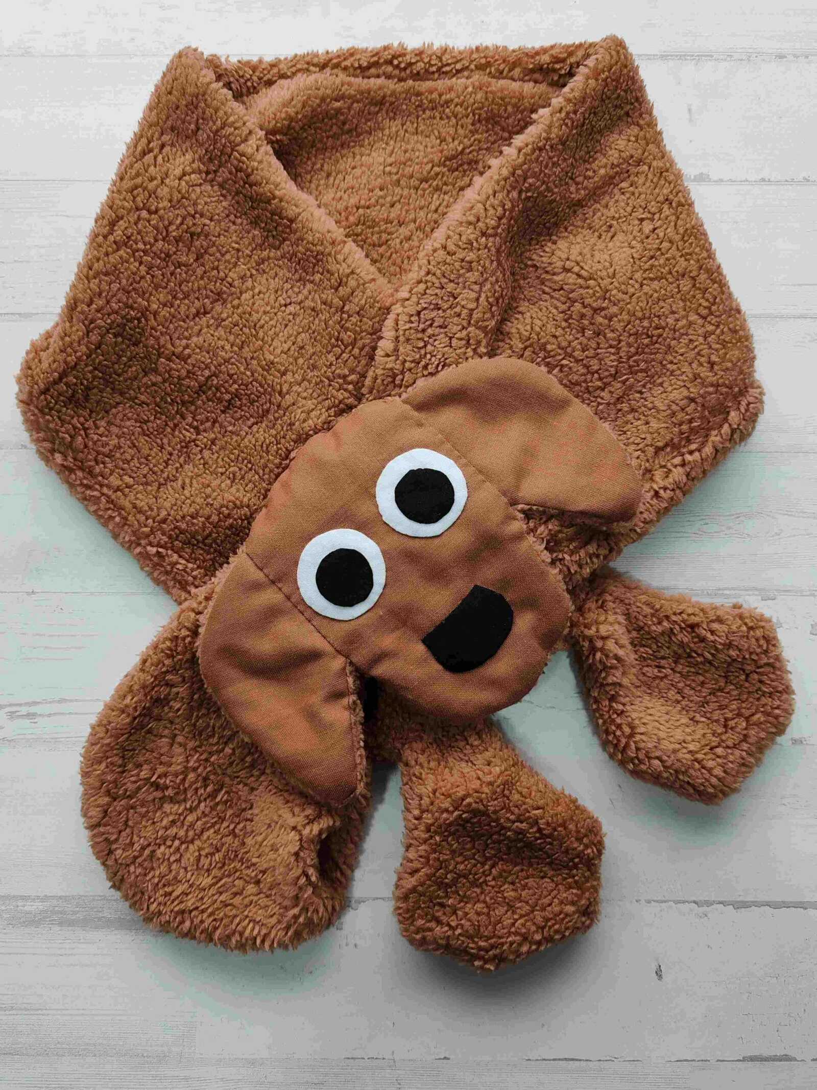 kit para confeccionar bufanda con forma de perro.